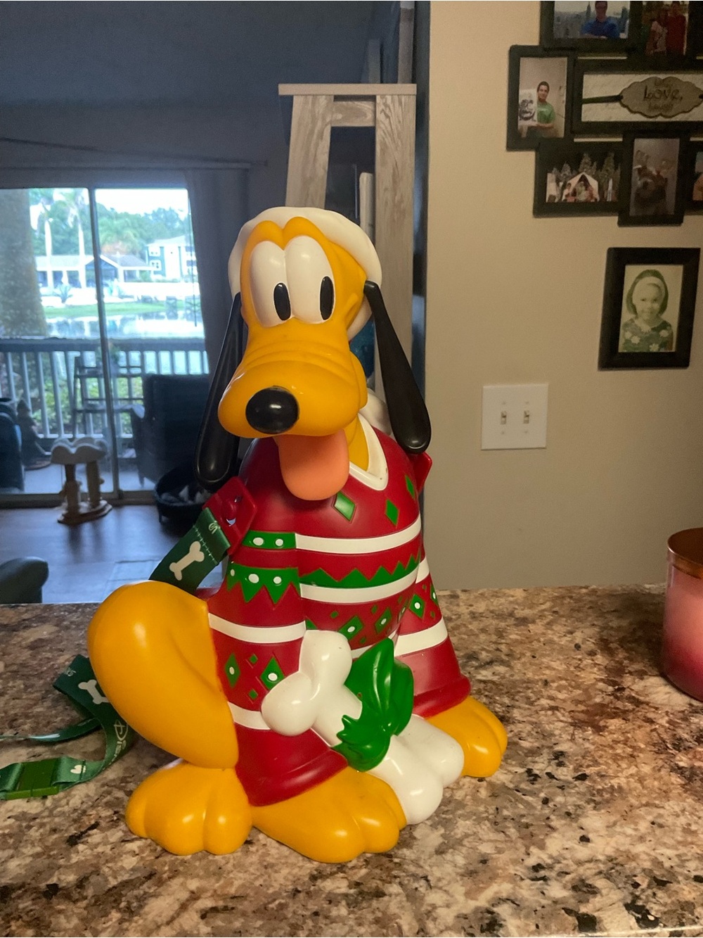 Disney Yellow Pluto Figurine in Red and Green Holiday Sweater Popcorn Bucket